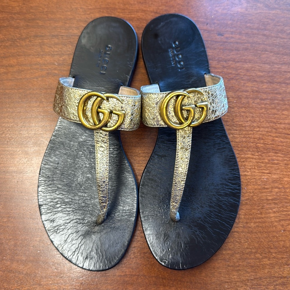 GUCCI SZ 38 Marmont Sandals Gold Tone. Gently used condition. Very stunning on.